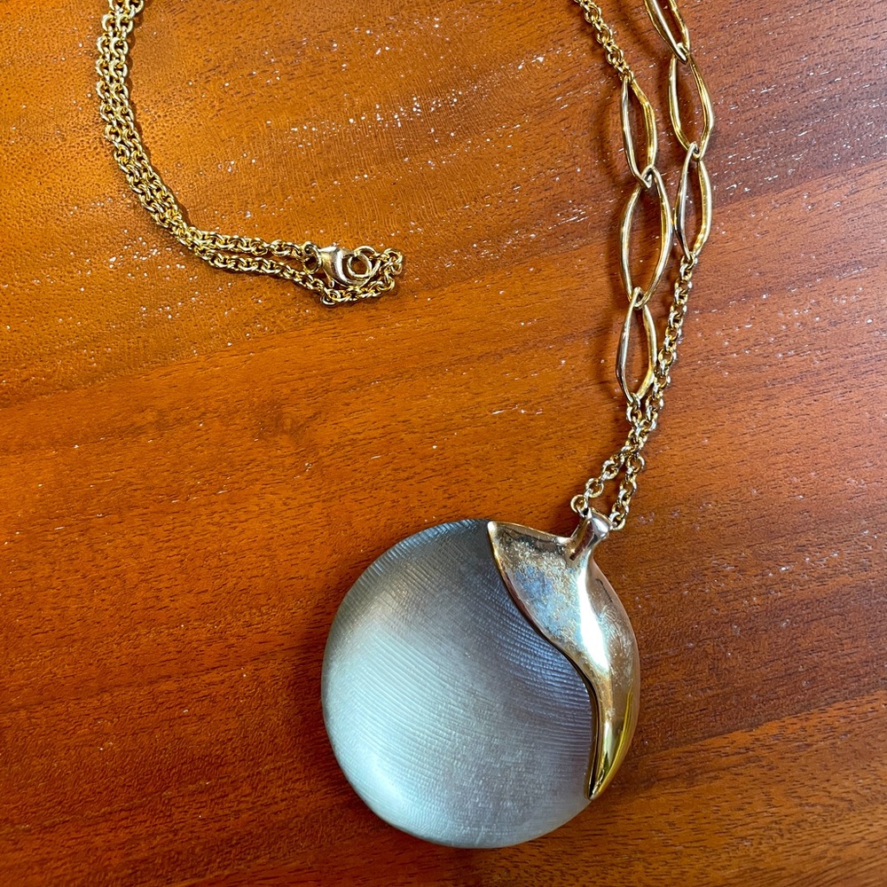 Alexis Bittar necklace. Grey lucite and gold metal. Never worn.